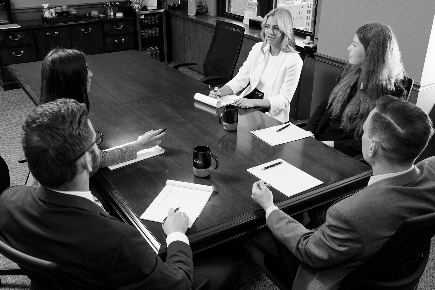 career-difference attorneys at conference table talking